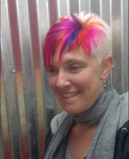 Platinum pixie with pink, purple, and orange streaks